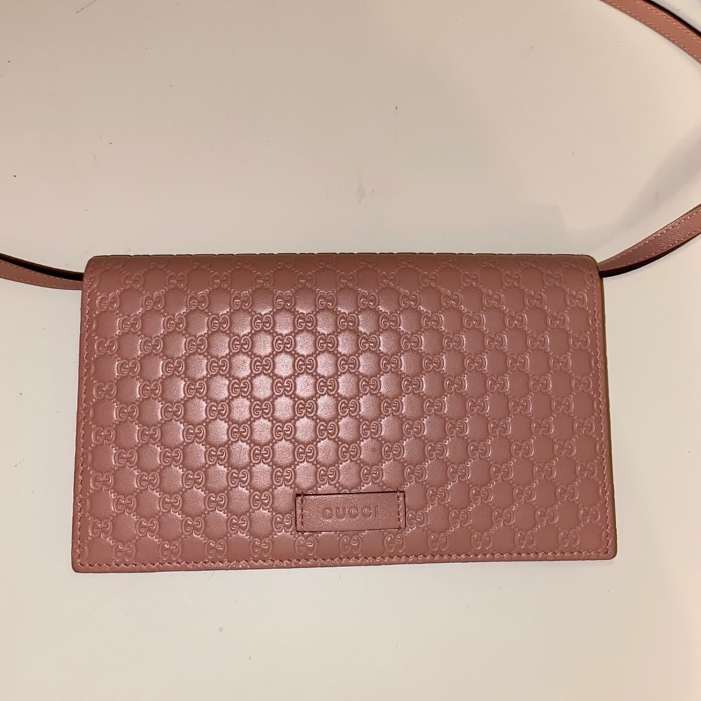 Pink Gucci cross body wallet
